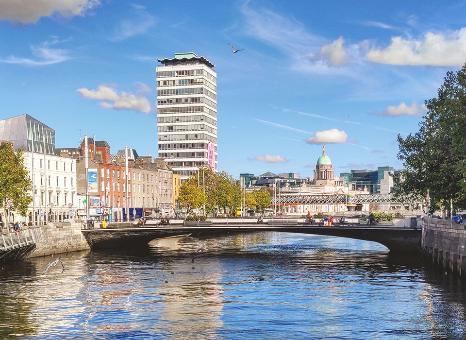 A bridge over a city river.